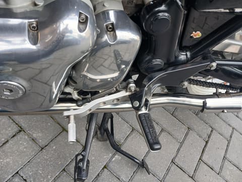 Close-up of the YSS rear shock, chain and Enfield Precision aluminium guard